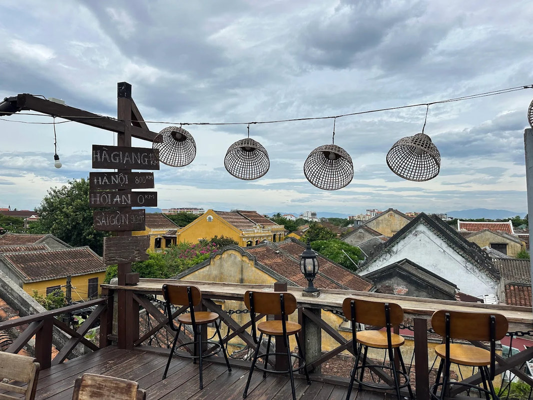 Fourth-floor panoramic views of Hoi An's ancient architecture and Thu Bon River